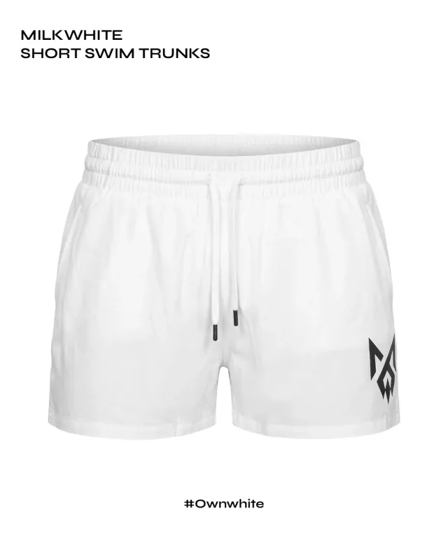 White MilkWhite Short Swim Trunks in Essentials campaign artwork with Ownwhite branding