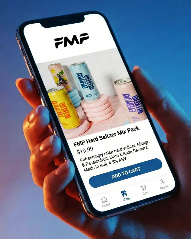 Responsive mobile-commerce website concept displayed across a laptop and mobile phone
